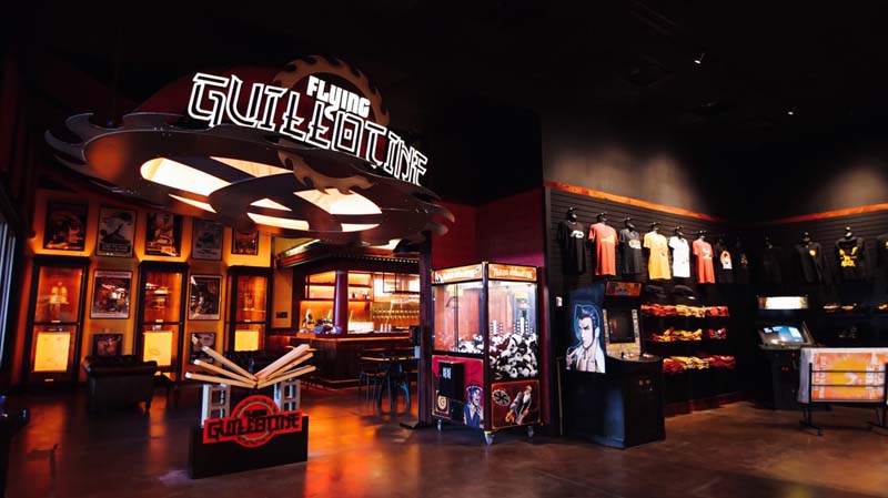 Perfect blend between WU-TANG and Cinema, The Guillotine Bar stands out with big neon and merch available.
